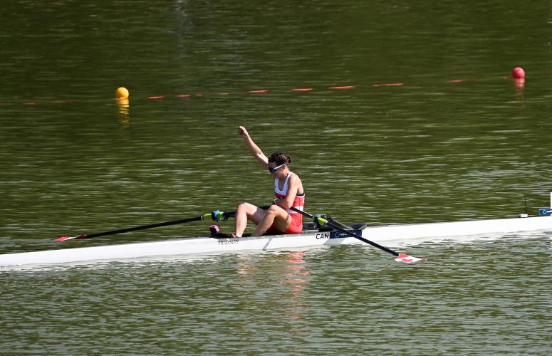 Karissa Riley cheers in her single at the finish line